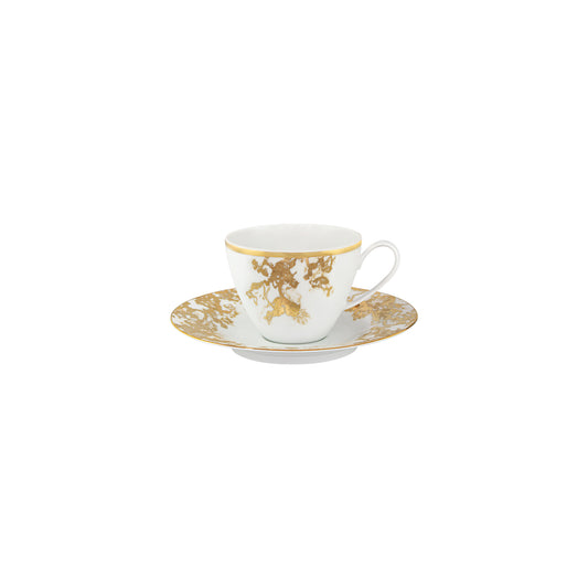 Gold porcelain tea cup and saucer